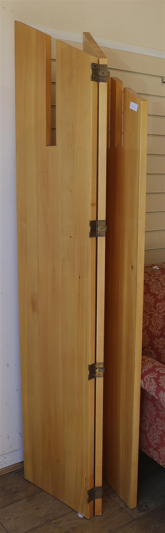 A Boie Clare three fold dressing screen, leaves W.42cm max. H.200cm